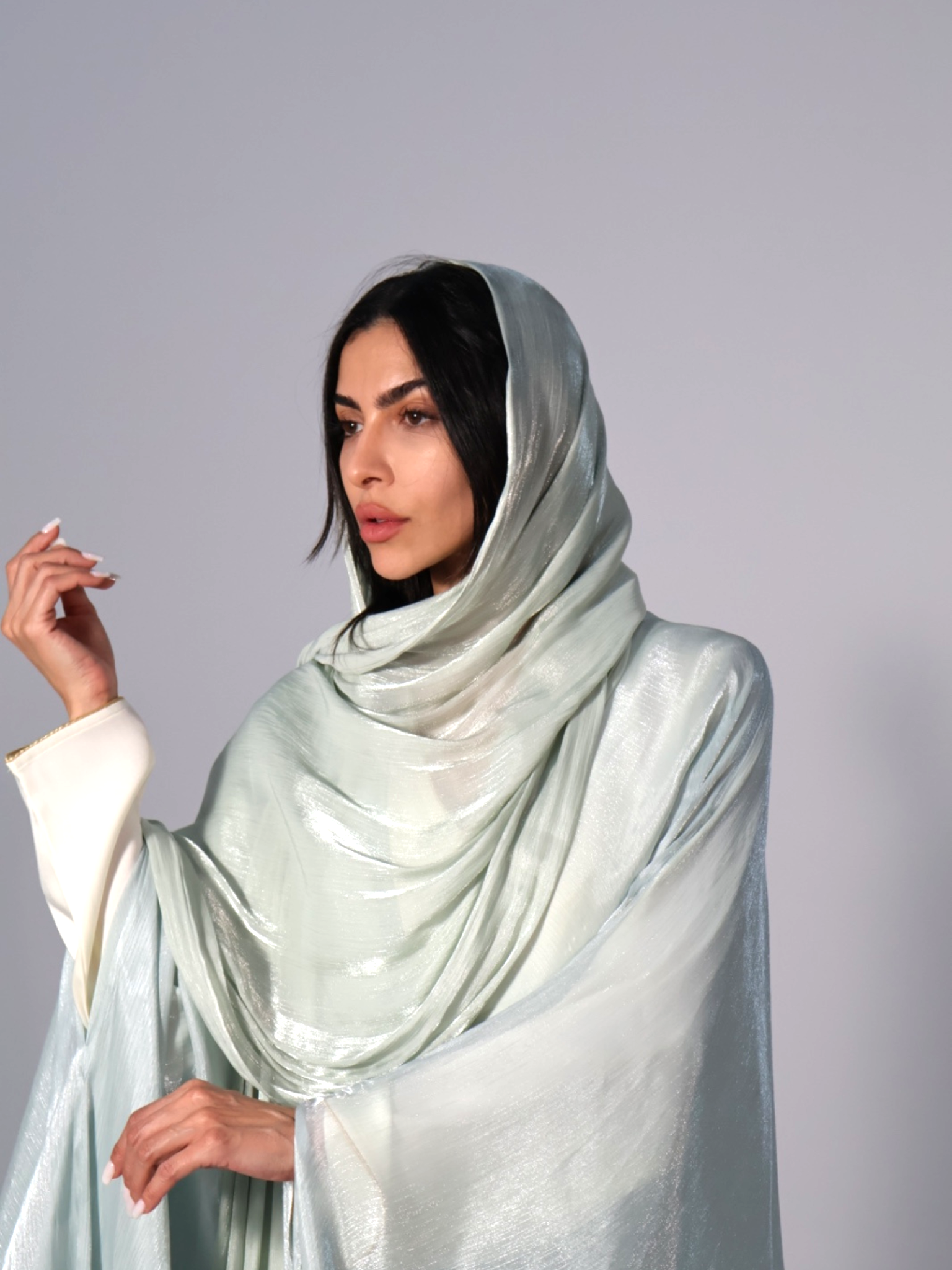 Woman wearing a light powder hijab 