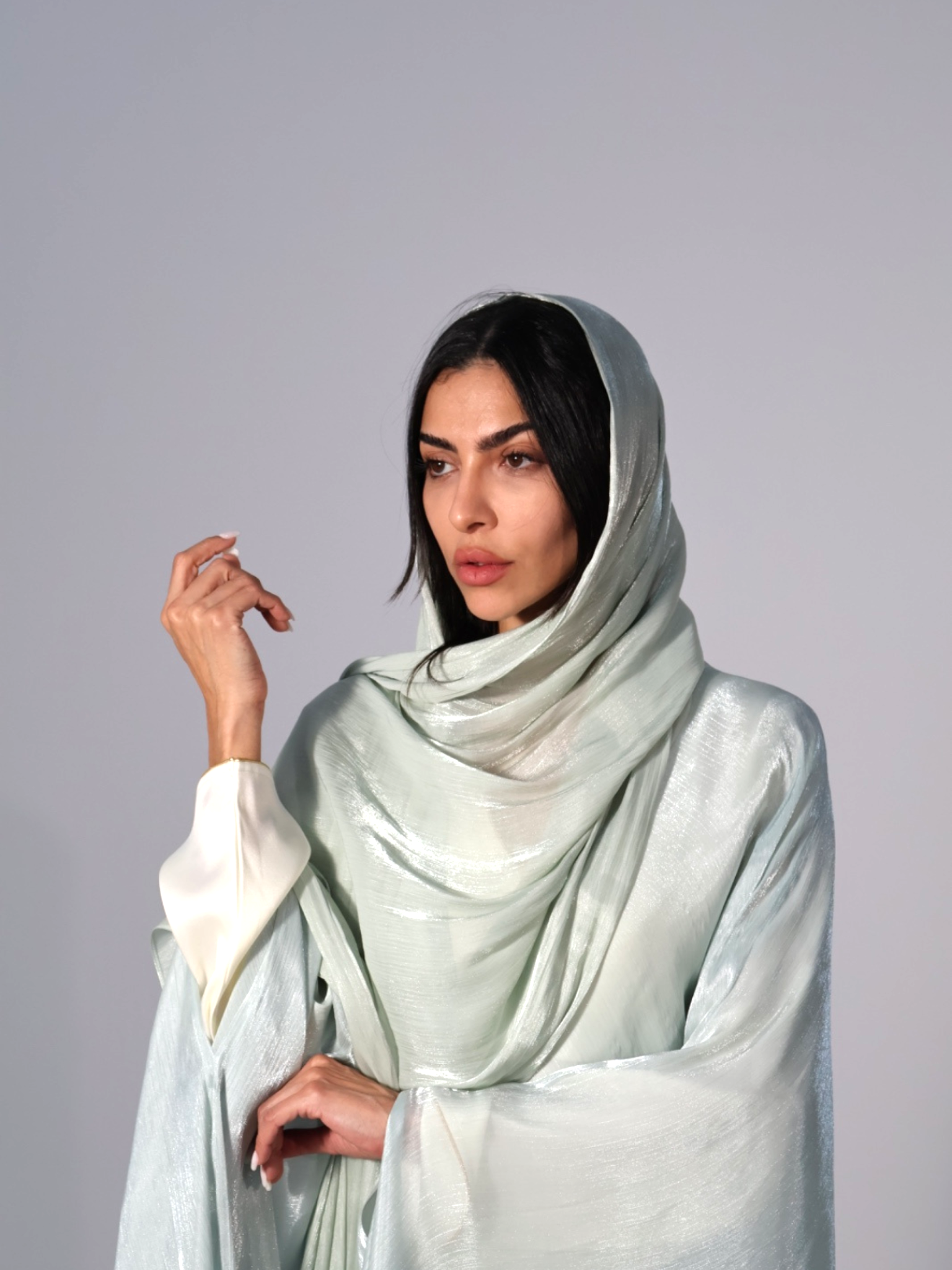 Woman wearing a light powder hijab 