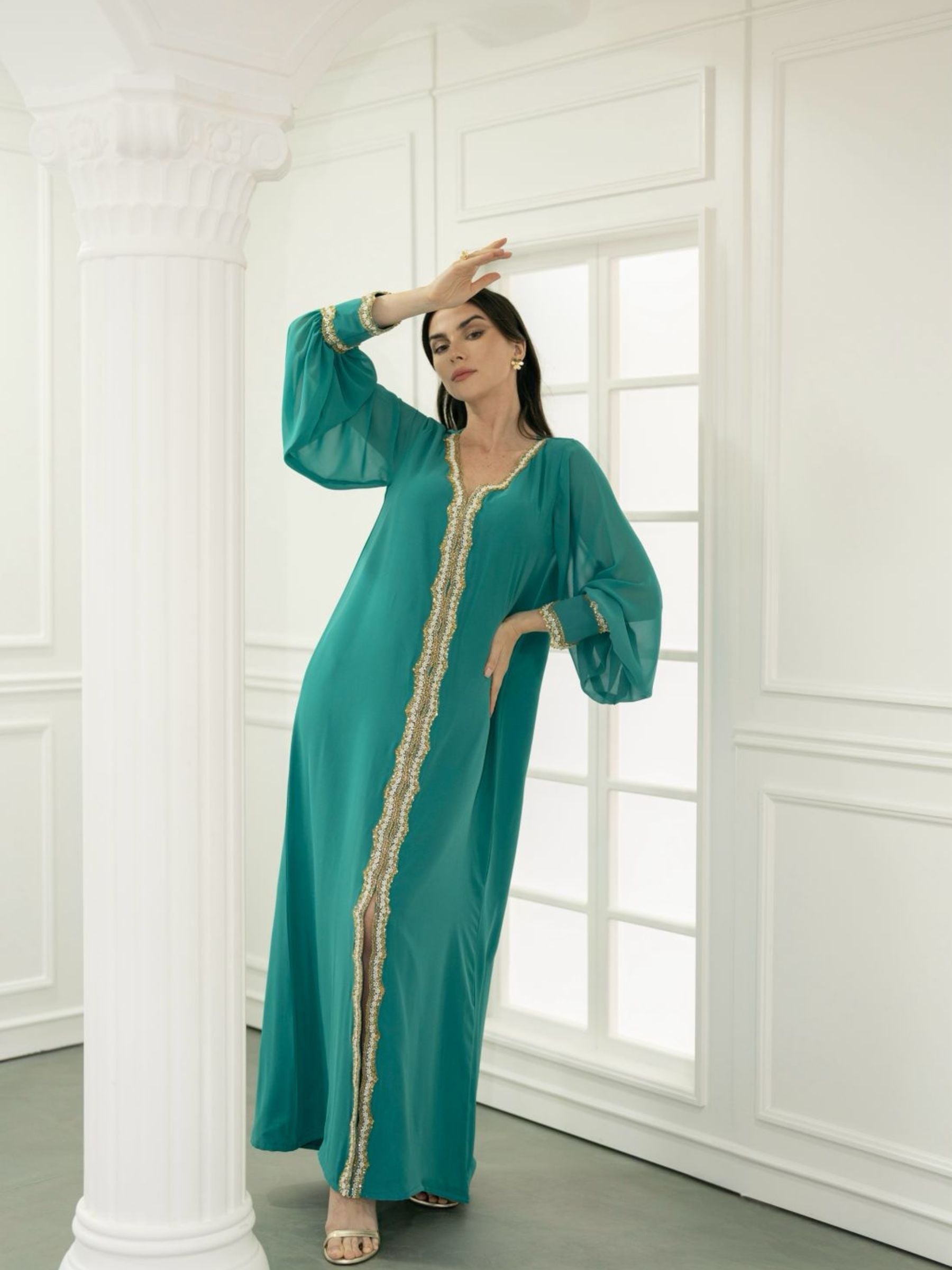 Maison Arabelle emerald green kaftan with gold embroidery.