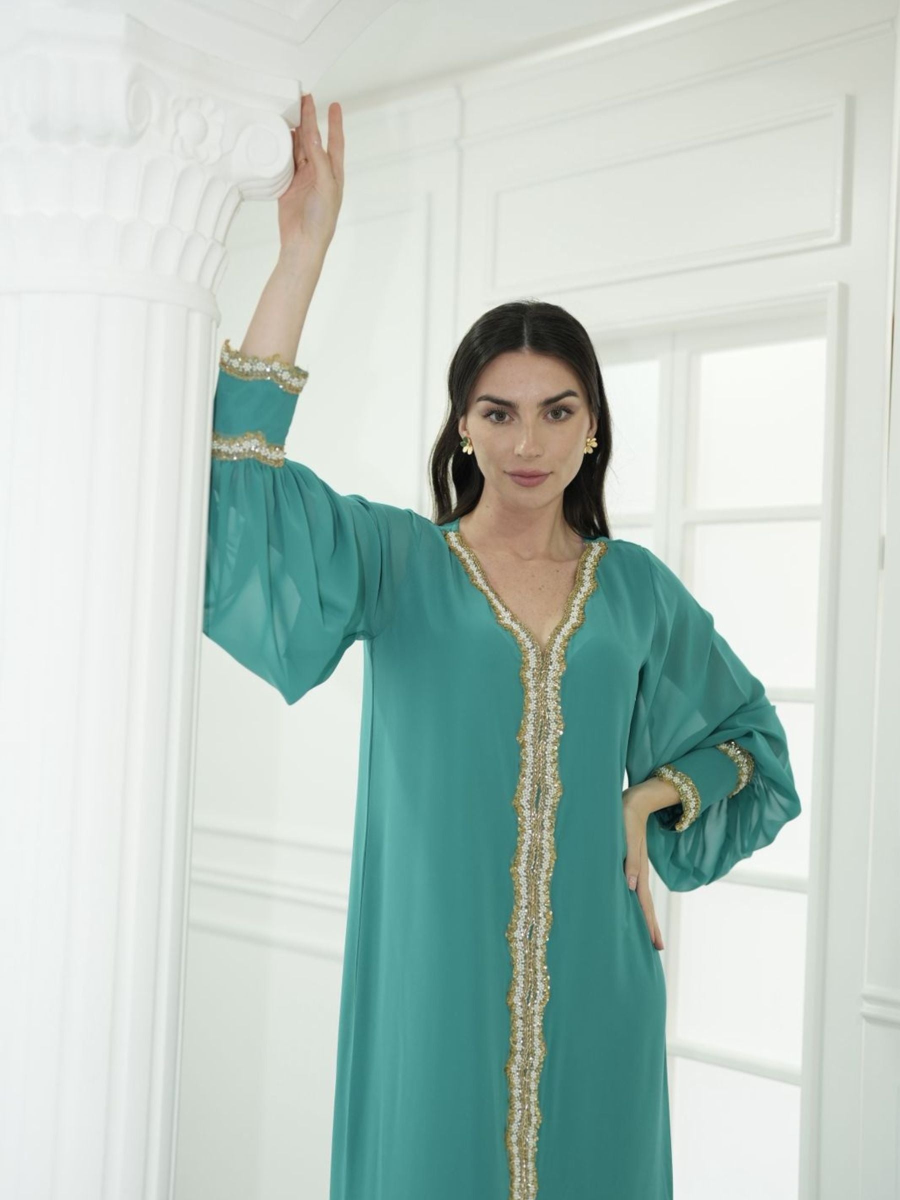 Maison Arabelle emerald green kaftan with gold embroidery.